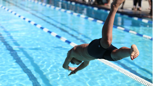 A man jumped into the pool for a swim